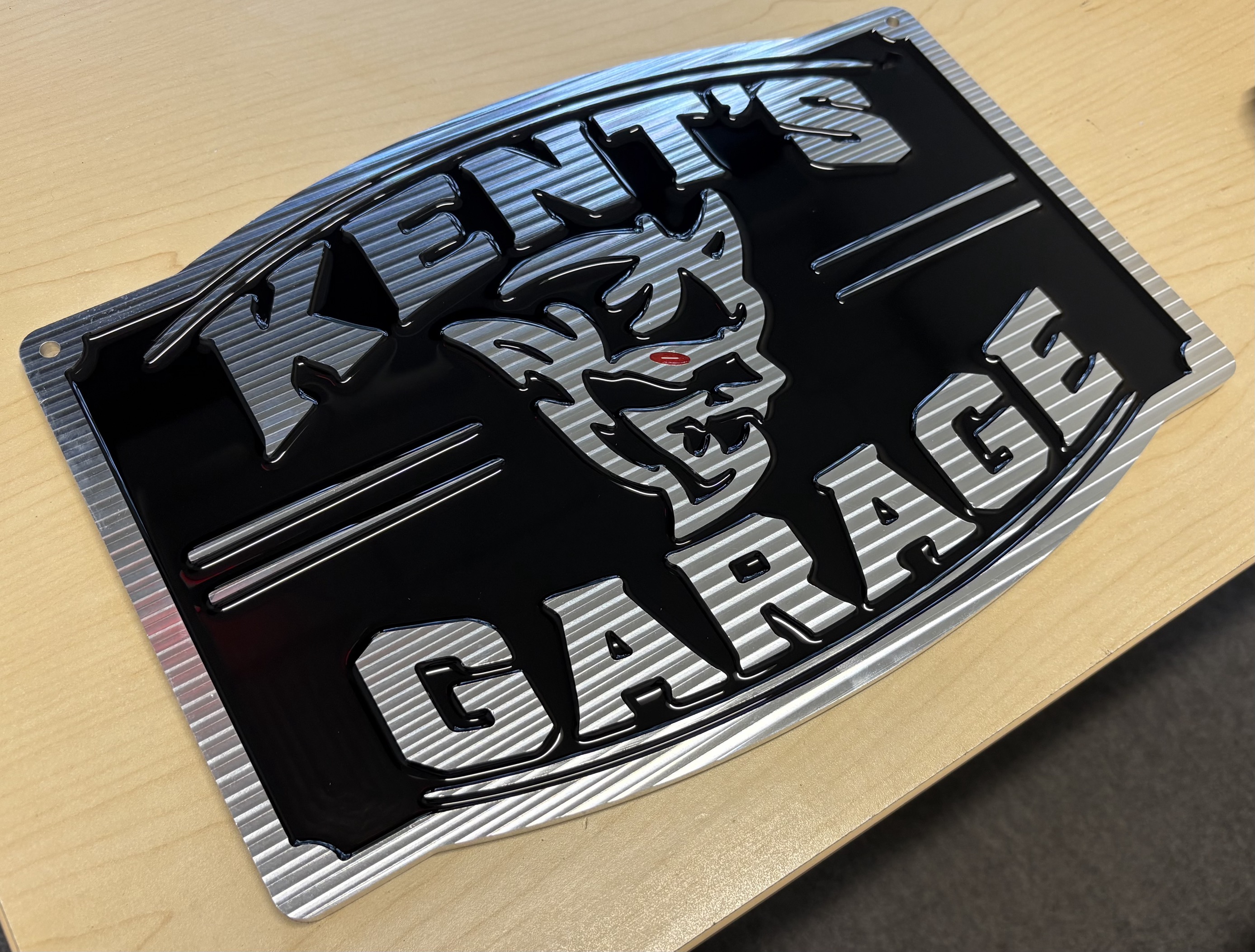 Custom CNC machined metal shop sign Kent's Garage detail view BD Manufacturing