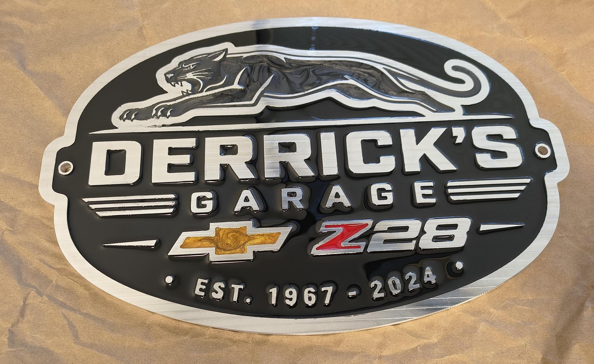 Custom CNC machined metal shop sign Derrick's Garage finished view BD Manufacturing