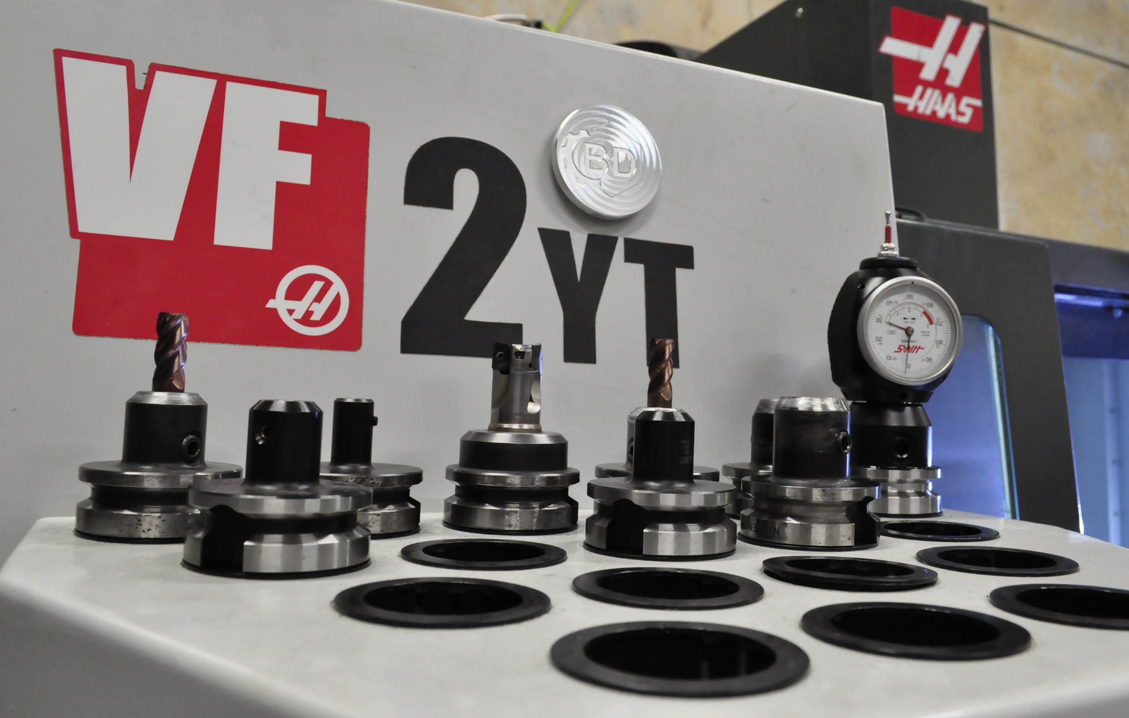 Custom CNC machined logo plate by BD Manufacturing