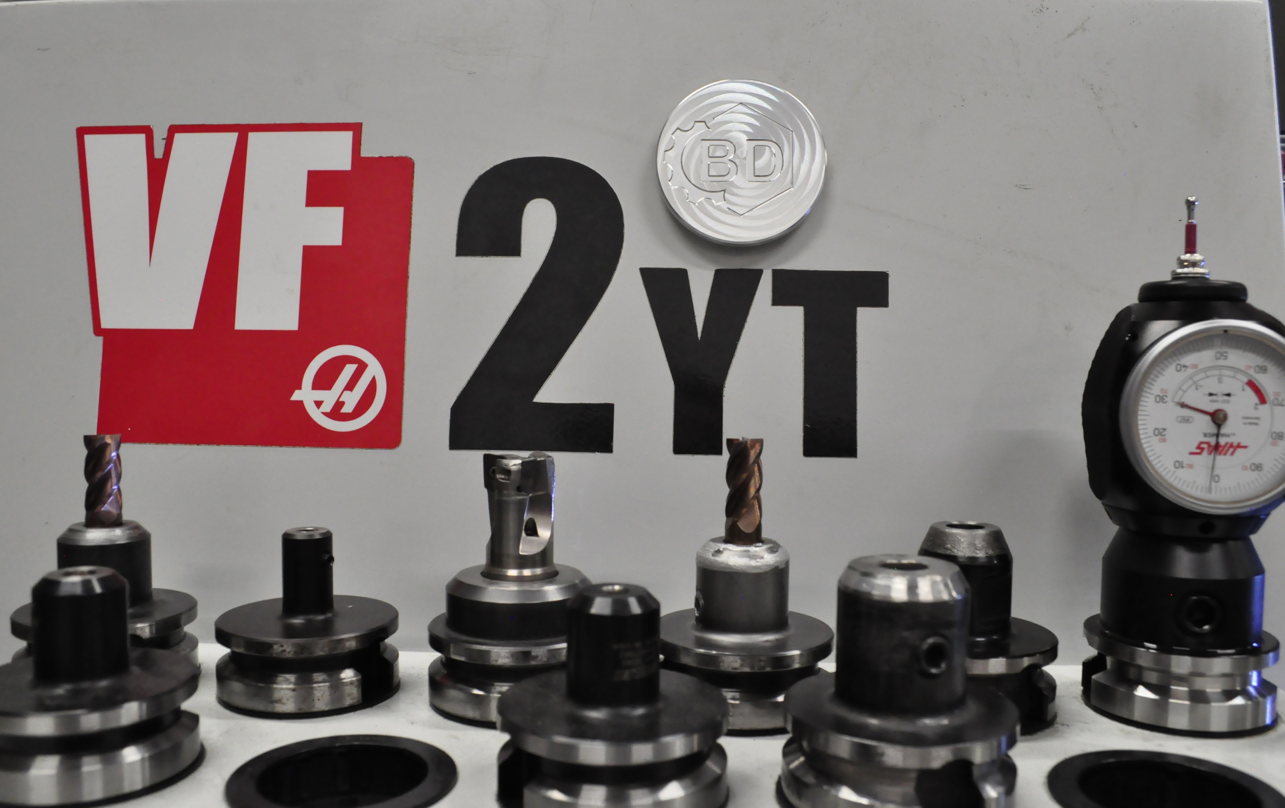 Custom precision machined logo plate detail view Jacksonville FL